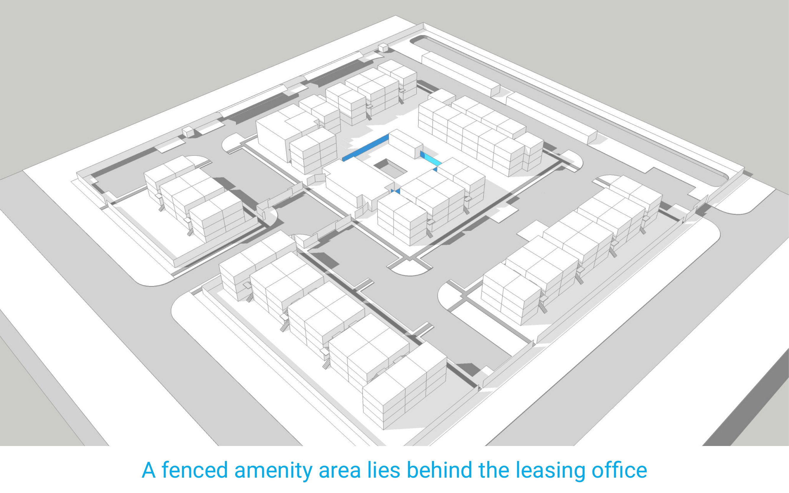 A fenced amenity area lies behind the leasing office