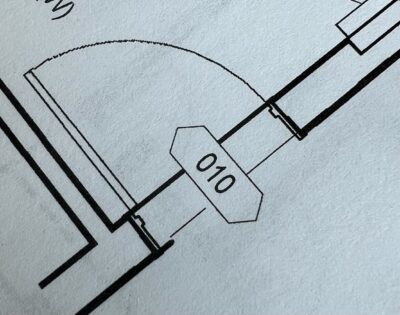 A door, drawn in revit, saved to PDF, printed, and then a picture taken of it